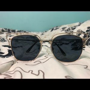 Sunglasses- black lenses with gold frames